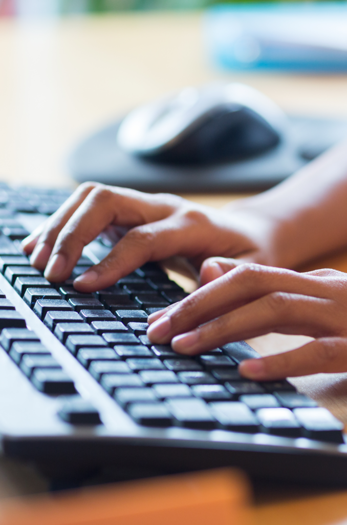 Hands on keyboard, filling out Leased Line Quote form